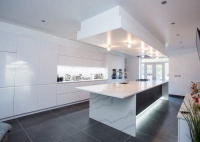 Slate Veneered Kitchen Fused With Calacatta Wrapped Quartz