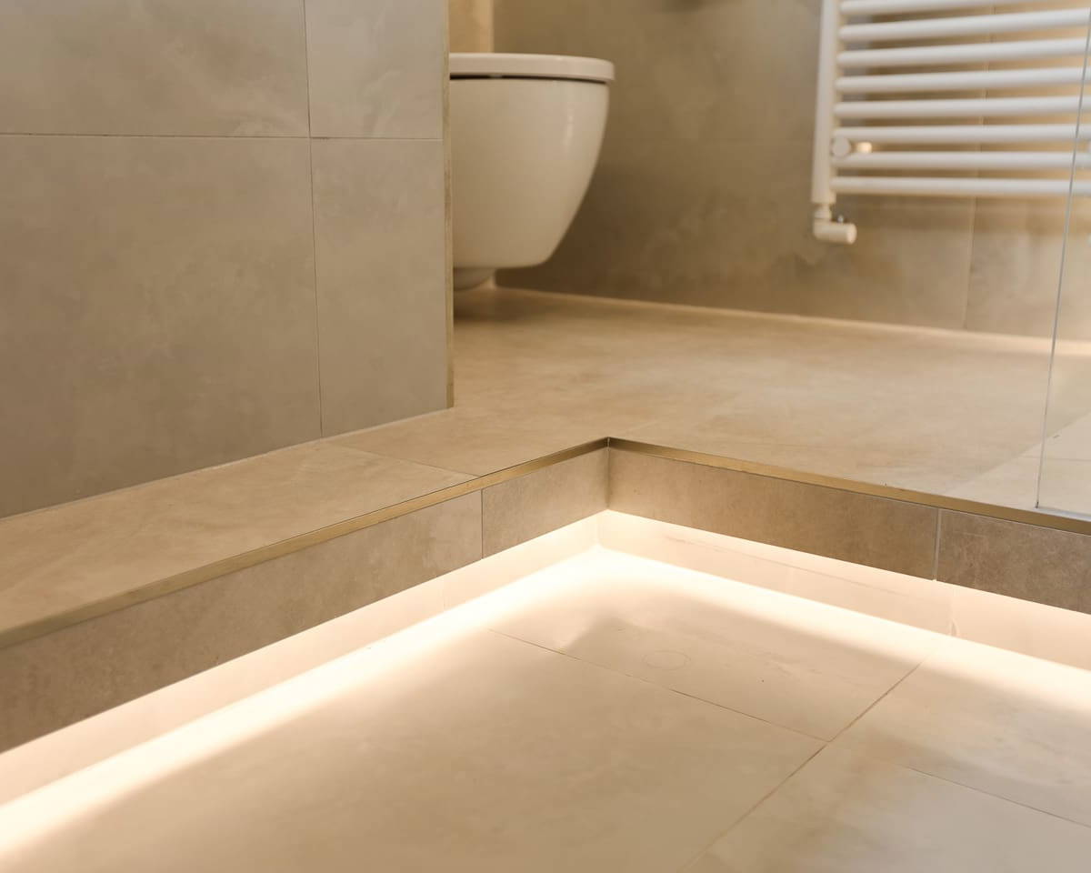 Bathroom plinth lighting Leonide Interiors